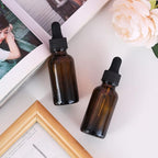 2 oz Dropper Bottle 12 Pack Amber Glass Boston Bottles 30ml with Eye Droppers Black Caps for Essential Oils, Perfume, Leak Proof Travel Bottles for Liquids